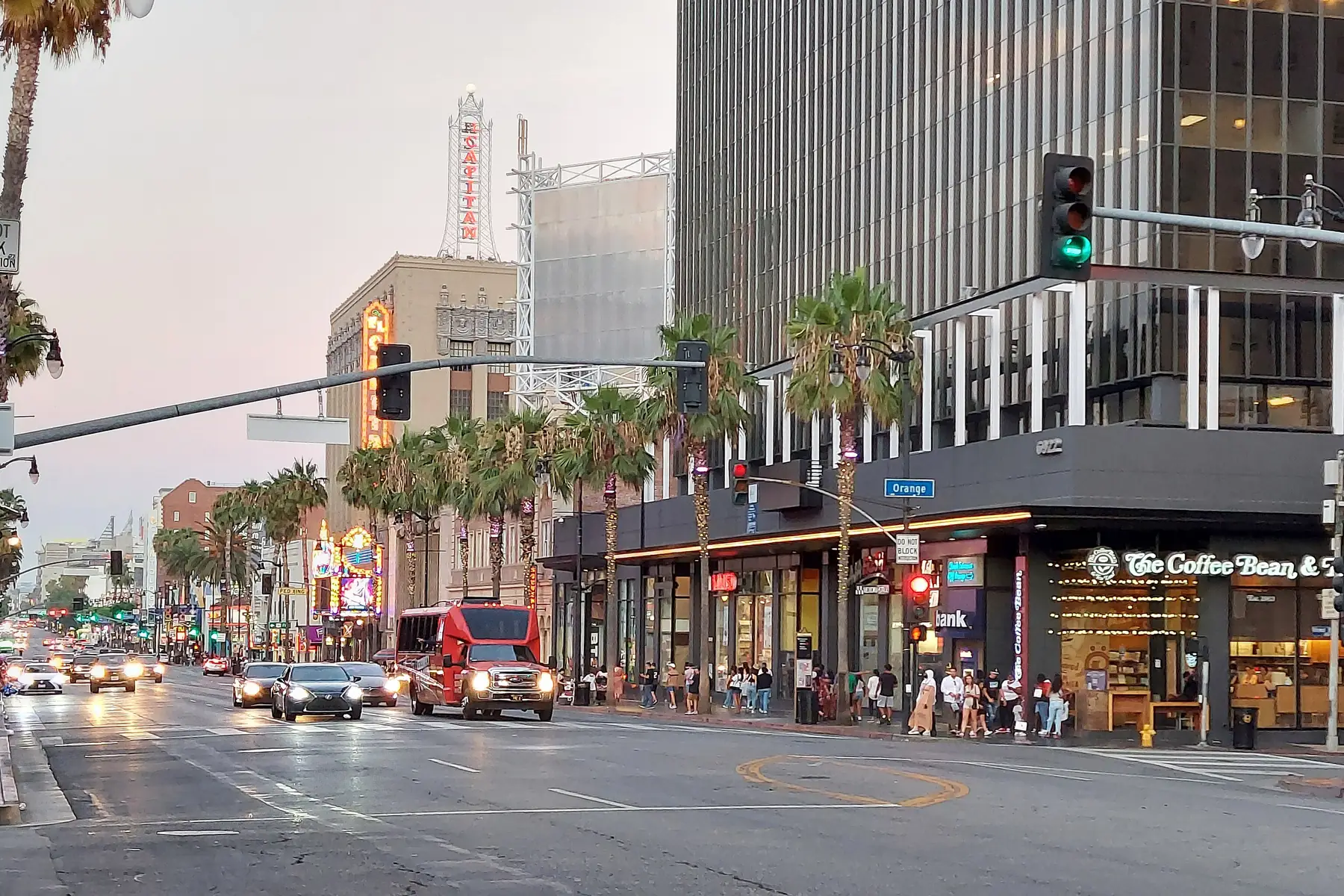 Santa Clarita Delivery 12 Hollywood Boulevard at dusk, palms down the street under a pink sky
