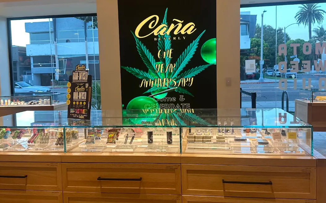 The service counter at Caña Beverly with the window and street beyond