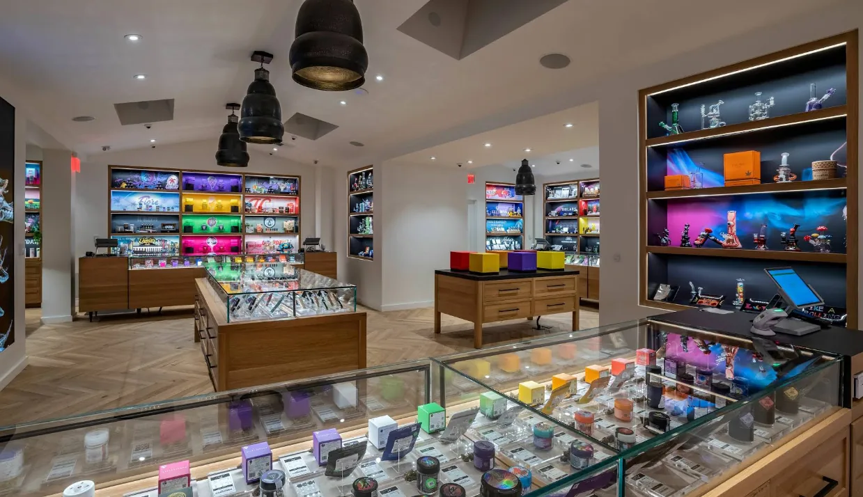 A wide view across the sales floor at Caña Beverly toward the back counter