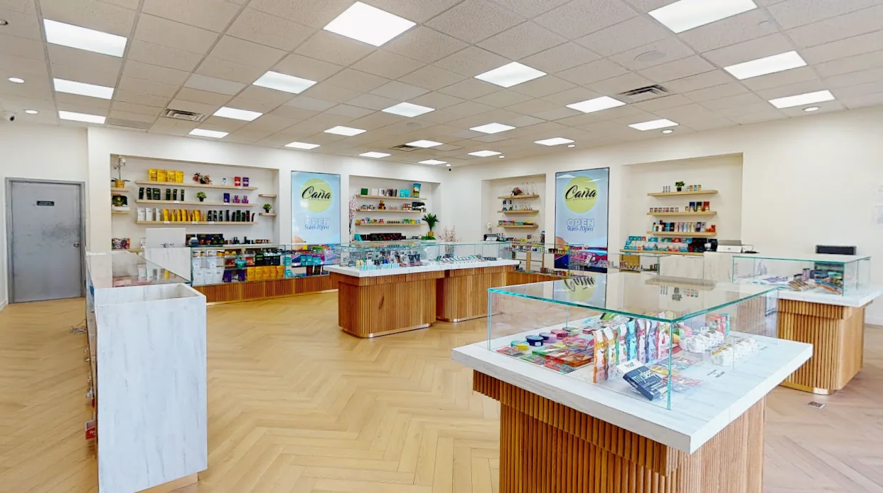 The sales floor at Caña Silver Lake, marble counters on a herringbone wood floor