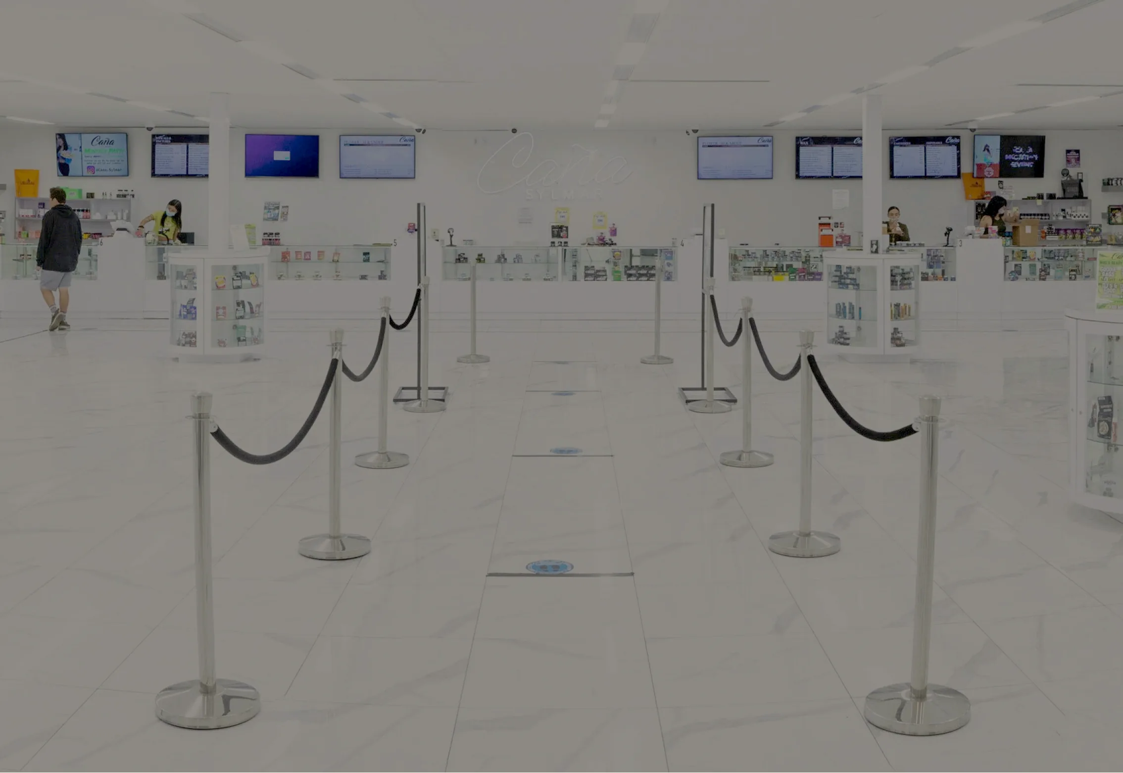 Santa Clarita Delivery 14 The sales floor at Caña Sylmar, marble under foot and numbered counters down the far wall